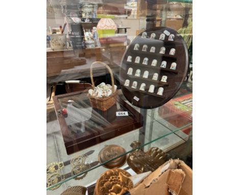 A quantity of thimbles on shelf &amp; a small jewellery cabinet