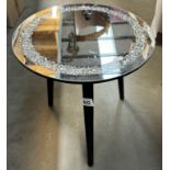 A mirrored art glass top tripod table. Height 40cm