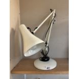 An unbranded anglepoise lamp
