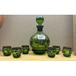 A vintage overlaid green glass decanter & 6 shot glasses