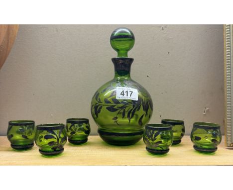 A vintage overlaid green glass decanter &amp; 6 shot glasses