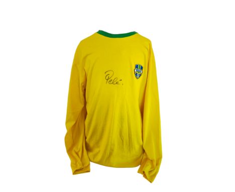 Pele signed Brazil no.9 retro 1970 World Cup yellow shirt. Edson Arantes do Nascimento, better known by his nickname Pelé, wa