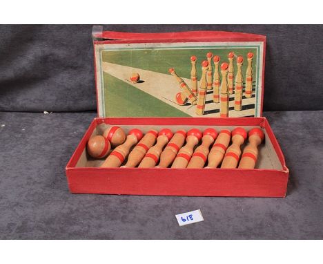 Skittles&nbsp;VINTAGE 1950’S/60’S SKITTLE SET IN ORIGINAL BOX Nine wooden skittles around 6 inches high and two wooden balls 