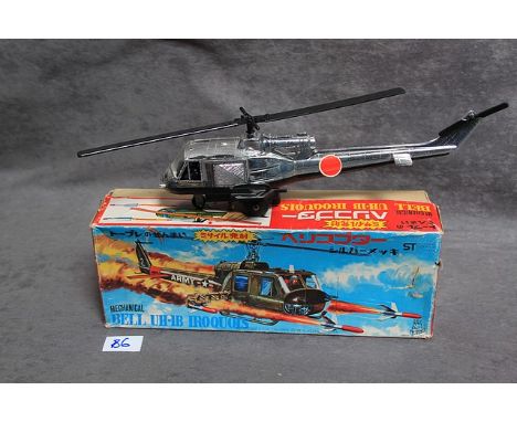 TPS (Japan) Mechanical Bell UH-1B Iroquois Helicopter Plastic Friction Helicopter Made In Japan The Bell UH-1 Iroquois (nickn