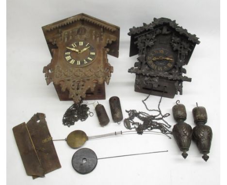 Early C20th Black Forest cuckoo clock with applied rustic carved decoration and weight driven movement H37cm and a later cuck