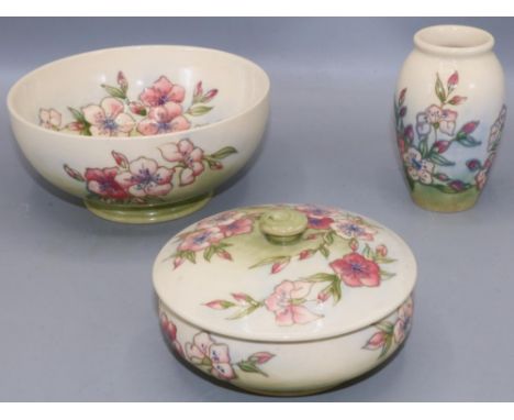 Moorcroft Pottery, Spring Blossom pattern  bowl, small vase and trinket pot, tube lined decoration of pink flowers on graduat