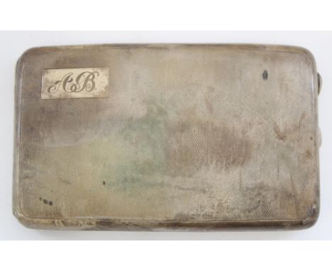 Hallmarked silver cigarette case, the curved engine turned body opening to reveal silver gilt interior, Charles Green and Co.