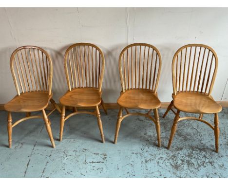 Set of four beech and elm hoop and stick back Windsor type chairs, on turned supports with crinoline stretcher, stamped H.E.R