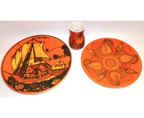 Poole Pottery Delphis - two chargers incl. one decorated with a ship, and a vase, decorated in orange, yellow and black glaze