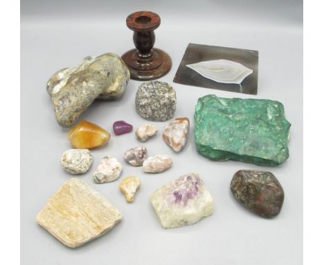 Mixed collection of rocks and minerals inc. amethyst, a small red stone candlestick, etc. 