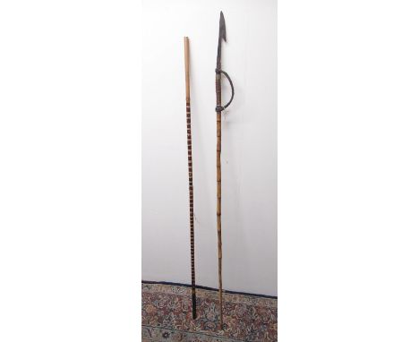 Indonesian blow pipe with carved wood quiver cont. darts, 2 ornately decorated dart quivers, a friction fire lighting kit in 