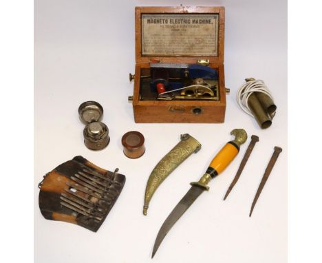 Late C19th/early C20th Magneto electric shock machine; travelling inkwell engraved with a boat and anchor; Indian ceremonial 