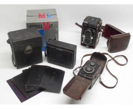 Boxed Yashica-Mat LM camera no. MTL 2050401, Franke &amp; Heidecke Rollieflex camera no. 136556 and an Ica Trona 212 folding 