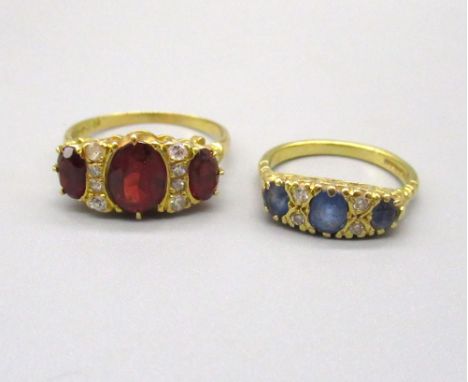 18ct yellow gold and red stone ring, size R, and an 18ct yellow gold diamond and sapphire ring, size J, both  stamped 750, 7.