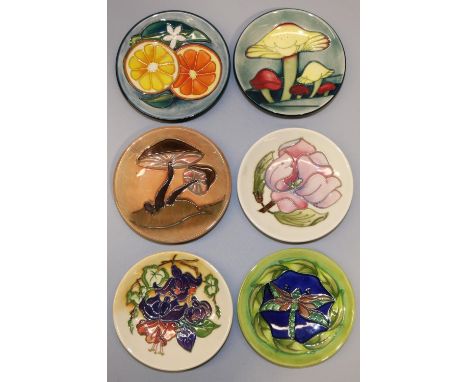 Moorcroft Pottery: six pin dishes/coasters - purple flowers on light orange ground, 2007; dragonfly on blue and green ground,