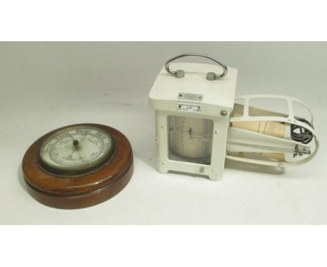 Casella London BSS 3231 barograph in painted metal finish no. 3039 H21cm and an early C20th 'Weekly Telegraph' oak barometer 