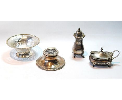 Silver capstan inkwell with inlaid tortoiseshell lid, Birmingham 1910, two condiments, and a pierced bowl.
