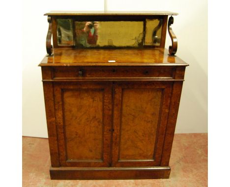 Mid-19th century burr oak chiffonier with gallery over mirrored back, crossbanded moulded rectangular top over frieze drawer,