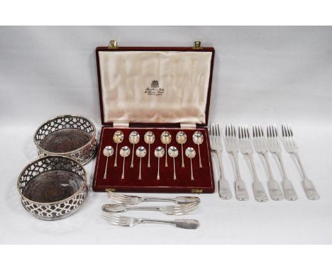 Set of twelve silver coffee spoons with seal ends, cased, a pair of Old Sheffield pierced decanter stands, and some EP fiddle