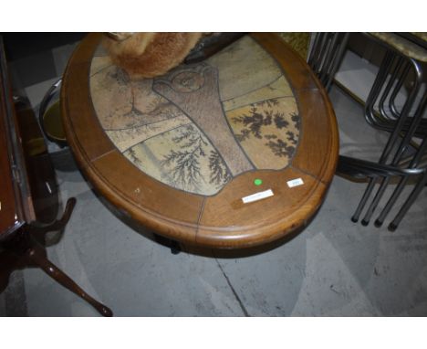 A vintage oval coffee table, oak and tile effect