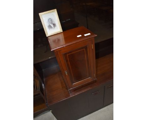 An Edwardian mahogany smokers or stationery cabinet, made by Frank Howard of Northampton, Cabinet maker and Professional foot