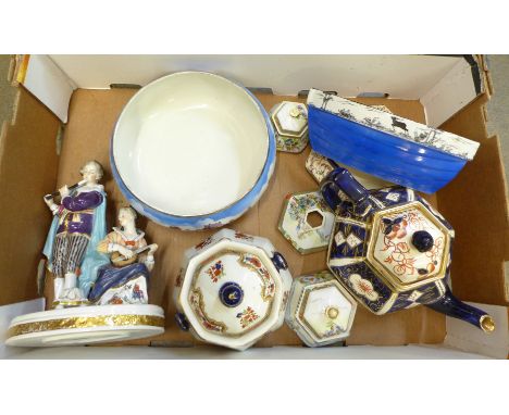 A Neapolitan figure group, a/f, an Imari teapot and two small lidded pots and stand and a fruit bowl with Tower of London tra