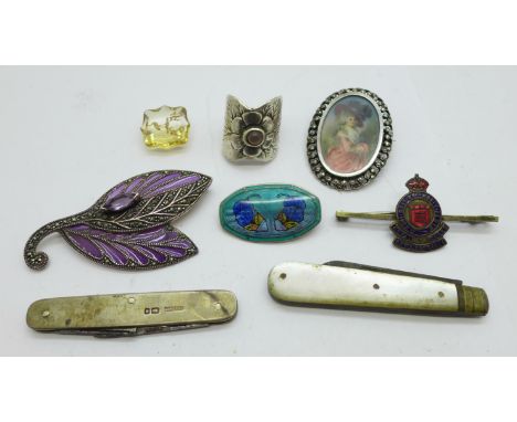 A silver and enamel Aksel Holmsen brooch, a/f, enamel scratched and lacking pin, a sterling silver mounted hand painted brooc