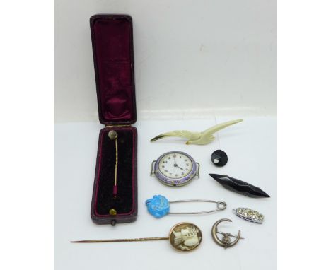 Two stick pins, an enamelled wristwatch head, a/f, two brooches, etc. 