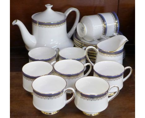 Royal Albert Sandringham teawares comprising twelve side plates, nine cups, a teapot and milk jug 