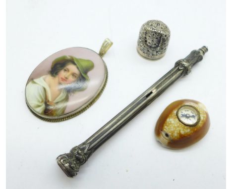 A silver mounted portrait pendant, a novelty compass mounted shell, a hallmarked silver thimble, a/f, and a Sampson Mordan pr