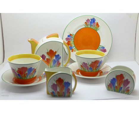 Wedgwood Clarice Cliff 'Tea For Two', one Crocus milk jug, sugar bowl and toast plate, one Crocus teapot and one pair of Croc