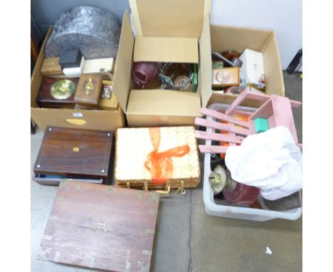 A microscope, a box of Christmas decoration, three albums of early 20th Century photographs, oil lamp base, hat boxes, prints