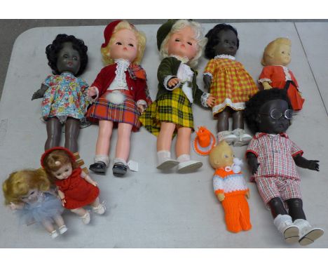 Nine dolls, Palitoy x2, black x3 and four others including a toy bench 