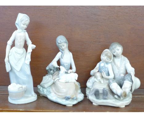 Two Lladro and one Nao porcelain figurines, ?Little Brothers? (ref 1230), designed by Juan Huerta, issued 1972 - 1991, 15cm, 