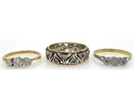 Three stone diamond gold ring, one similar both stamped 18ct PLAT and 9ct gold diamond heart band Condition Report 18ct diamo