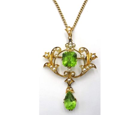 Edwardian gold peridot and seed pearl pendant necklace stamped 15ct Condition Report Approx 15.2gm gross, chain length = 54cm