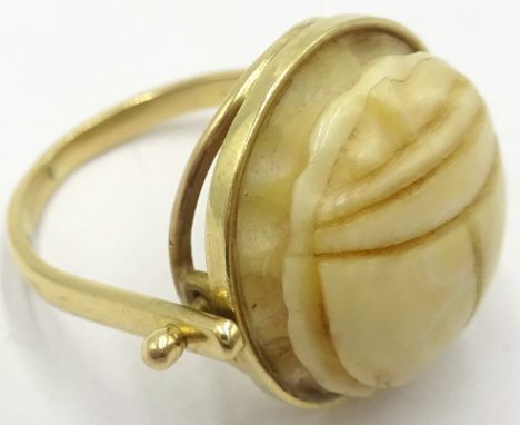 18ct gold (tested), bone scarab beetle swivel ring  Condition Report Approx 3.3gm, size QClick here for further images, condi