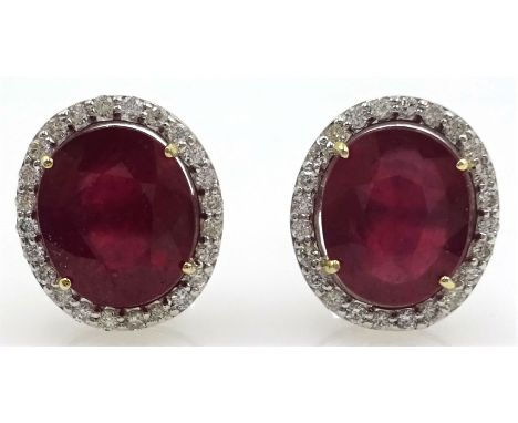 Pair of 18ct white gold ruby and diamond cluster stud ear-rings, rubies stamped 750, rubies approx 4.6 carat, diamonds approx