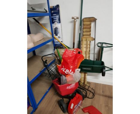 A SUBSTANTIAL AMOUNT OF GARDEN TOOLS INC SEEDERS SHOVELS ETC
