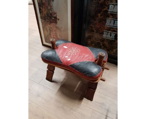 A VINTAGE CAMEL STOOL