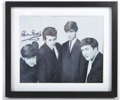 The Beatles - Pete Best - Original Drummer - an autographed 8x10" black and white photograph of the original line-up, signed 