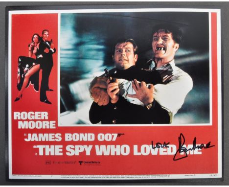 James Bond 007 - Sir Roger Moore (1927-2017) - The Spy Who Loved Me - an impressive signed 8x10" colour photographic lobby ca
