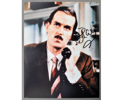 John Cleese - English Writer &amp; Actor - autographed colour 8x10" photograph of him as the iconic Basil Fawlty in Fawlty To