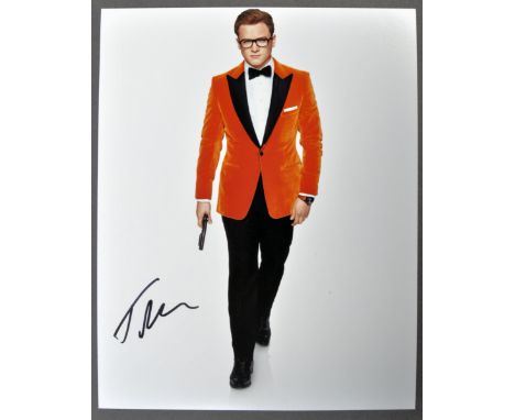 Kingsman 2 : The Golden Circle (2017) - Taron Egerton - great autographed 8x10" colour photograph from the film, signed neatl
