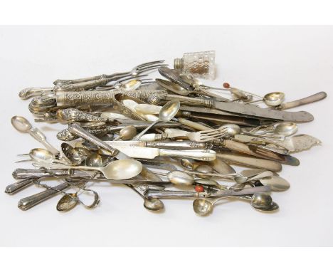 An assortment of silver flatware, etc