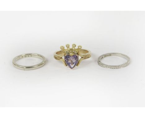 A gold single stone amethyst heart and split pearl stick pin later converted to a ring, an 18ct white gold wedding ring, and 