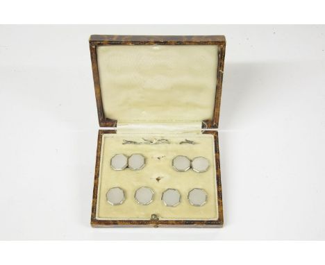 A part silver and mother of pearl octagonal dress set, including cufflinks and dress studs in box