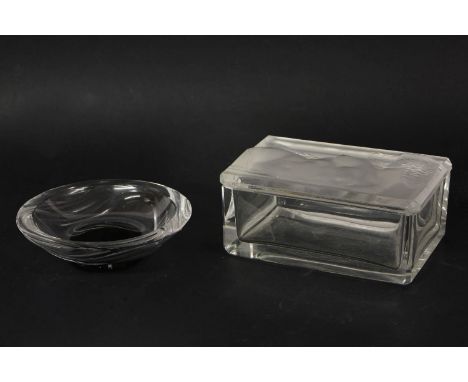 A Lalique style clear glass box and cover, the frosted cover moulded with a nude, 14cm long, and an Orrefors glass bowl, with