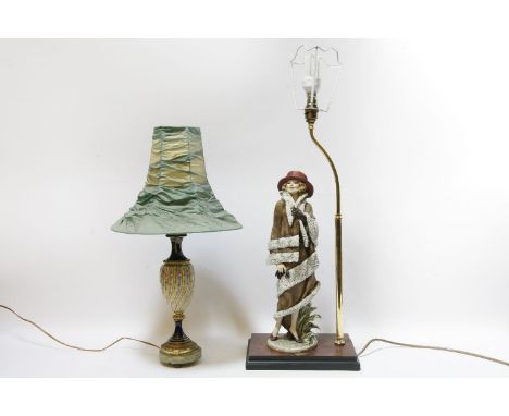 A figural table lamp, and one other