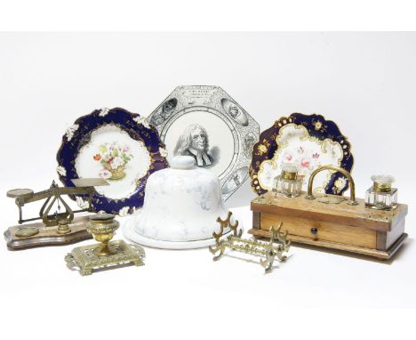 An oak and brass mounted desk stand, a Strut pen stand, an inkwell, and a set of postal scales, a cheese dish, and mounted co